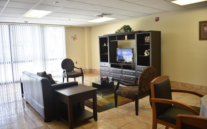 New Horizons Apartments Common room TV area