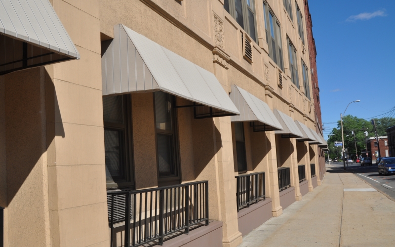 Tribune Apartments exterior and sidewalk