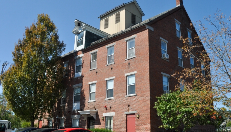 Sugar River Mills exterior and parking lot