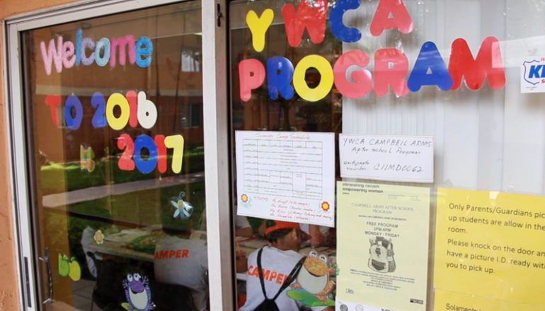 Campbell Arms Apartments YMCA program signs