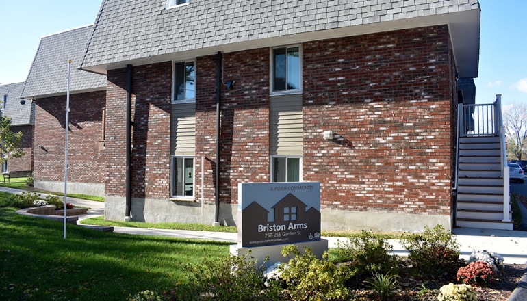 Briston Arms Apartments exterior and sign 